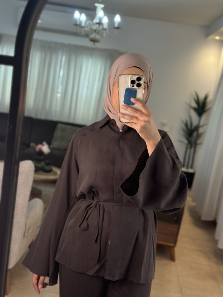 طقم بني، زرار